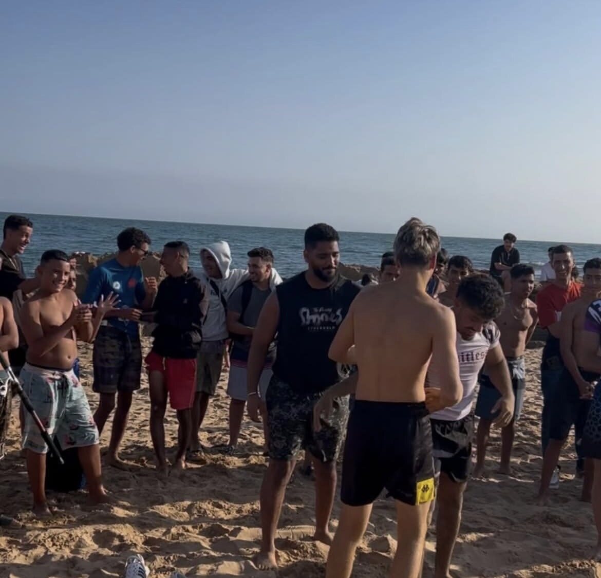 Community gathered for a beach event