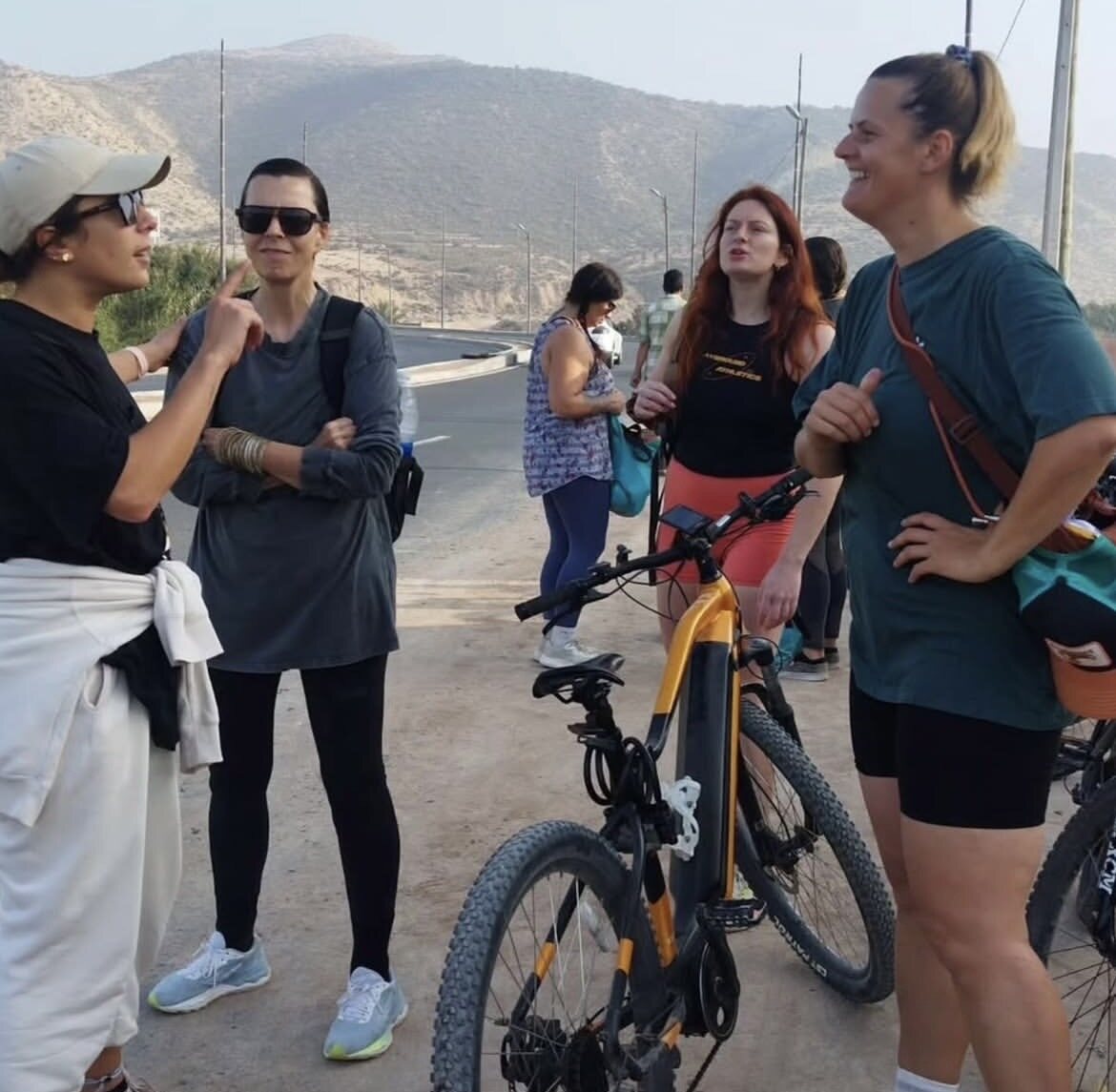 Women gathering with bicycles